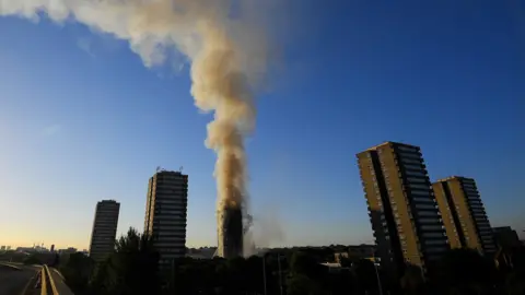 Reuters/Toby Melville The A40 - a major route in and out of London - was closed both ways as rush hour began with smoke continuing to pour out of the building