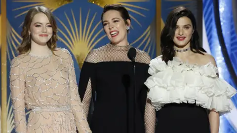 Reuters Left-right: Emma Stone, Olivia Colman and Rachel Weisz