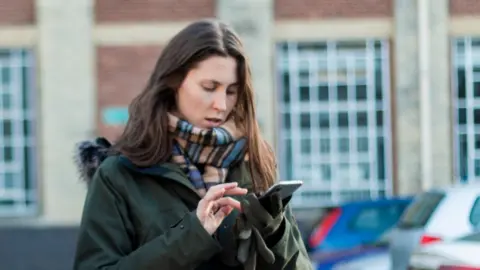 Kate Dow Kate Dow on a film set