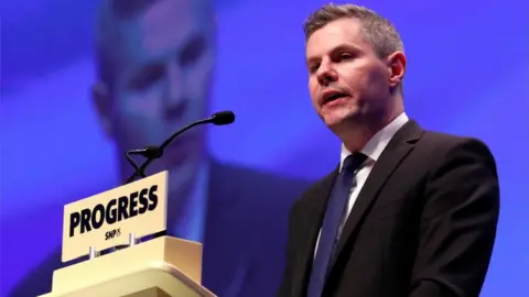 Reuters Derek Mackay