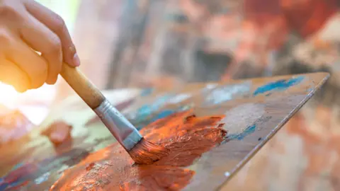 PhotoBylove/Getty Images Orange paint