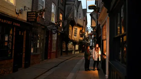 OLI SCARFF/AFP via Getty Images The Shambles