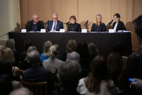 PA The legal team representing 37 women, and Natacha - second from right - who told the press conference Fayed attacked her.