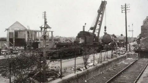 Soham Museum Train engine being winched up following an explosion at Soham in 1944