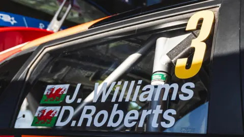 Co-driver killed in crash at Jim Clark Rally in Scottish Borders 10 James Williams Rallying Close up of car window with J.Williams and D.Roberts on the windscreen