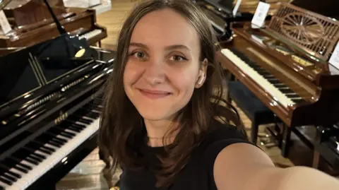 Helen Martyniuk with pianos in the UK