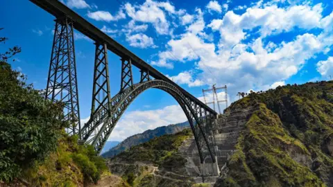 A view of newly constructed Chenab Bridge, World's highest Rail arch bridge of Indian Railways on Udampur- Srinagar-Baramulla-Rail link project during its media preview in Reasi district, on March 26, 2023 in Katra, India.