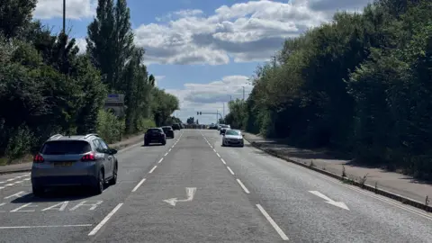 Cars driving on Castlemeads Way