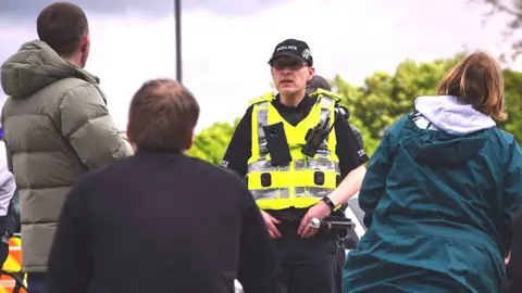 Getty Images police officer chats to the public