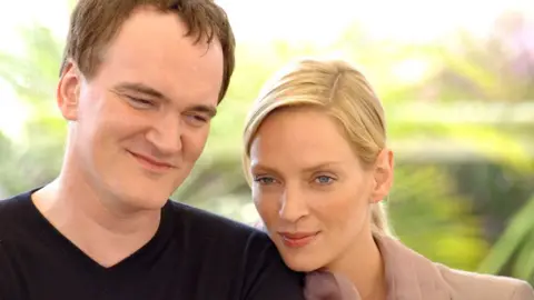Getty Images Quentin Tarantino and Uma Thurman during 2004 Cannes Film Festival - "Kill Bill Vol. 2" - Photocall at Palais Du Festival in Cannes, France