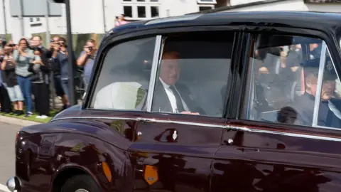 Reuters King Charles in the royal limousine