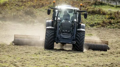 National Trust / PA Tractor sowing seeds in north Devon