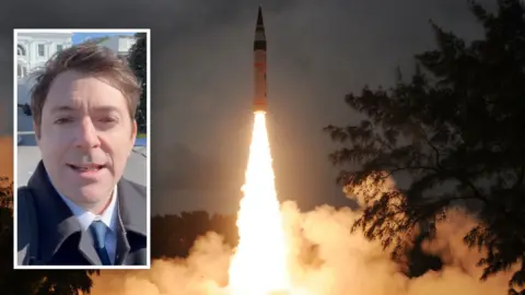 Dan Bush in a small window. Main photo is a nuclear missile test launch.