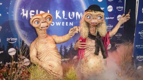 Getty Model Heidi Klum and husband Tom Kaulitz, both dressed as E.T. at Klum's 23rd Annual Halloween Party at the Hard Rock Hotel New York