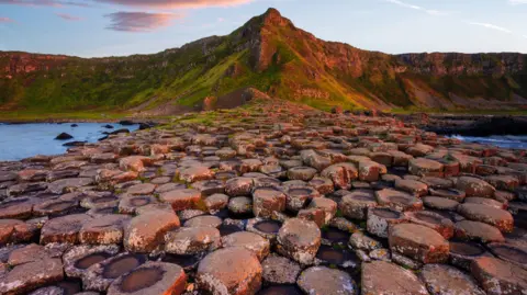  County Antrim - Northern Ireland.Giant's Causeway area of about 40,000 interlocking basalt columns, result of ancient volcanic eruption.