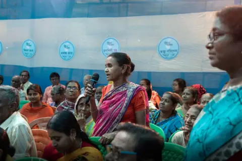 Women attending a payment   campy  successful  Kolkata