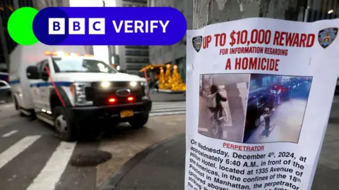 A poster is attached to a lamp post outside the Hilton hotel near the scene where the CEO of UnitedHealthcare Brian Thompson was shot dead in Midtown Manhattan, in New York City, US, on 5 December 2024