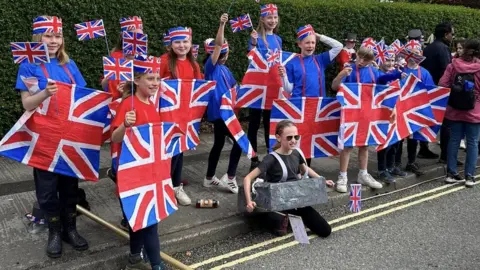 Julia Bryson/BBC Most local primary schools take part in the community event