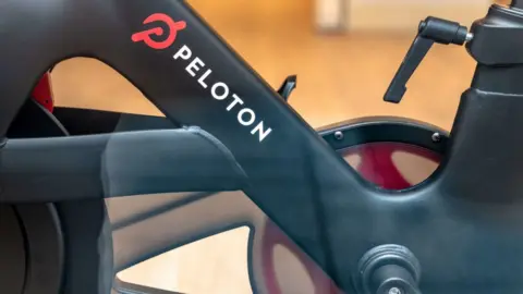 Getty Images Peleton's logo is seen on the frame of its exercise bike in this photo