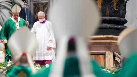 Getty Images Pope Francis leads a mass for the Synod of Bishops opening at St Peter’s Basilica on October 10, 2021 in Vatican City, Vatican