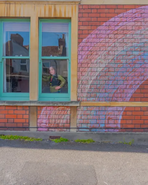 Tom Skipp Indy and a rainbow