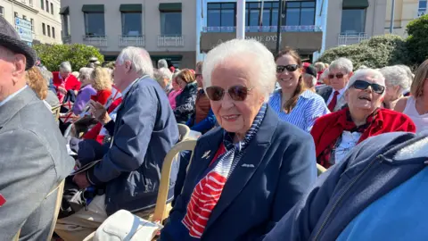 Maureen St George in Liberation Square on Liberation Day 2025 in St Helier, Jersey.