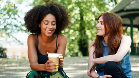 Getty Images Women chatting