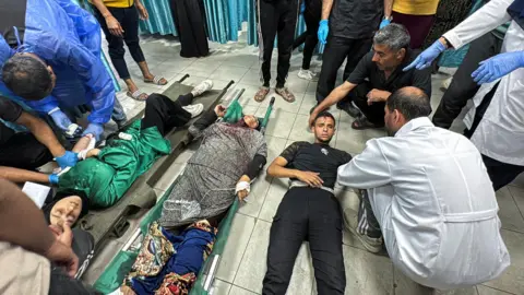 Reuters Wounded Palestinians being treated at Kamal Adwan Hospital in northern Gaza (21 October 2024)