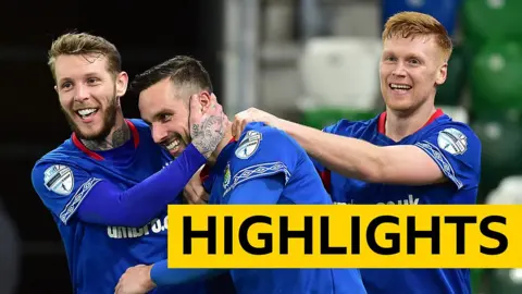 Linfield players celebrate