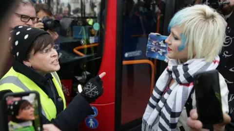 Getty Images A Pro-Brexit protester argues with a woman holding opposing views in Parliament square during a demonstration in central London