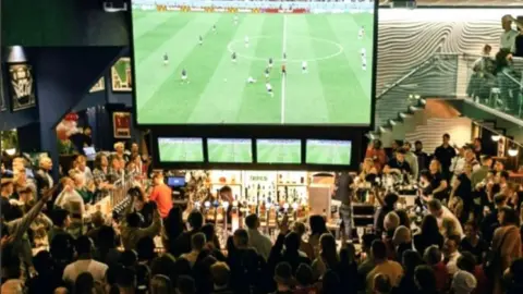 Wild Card Bar and Grill Instagram Crowds gathered to watch the game at Wild Card Bar and Grill