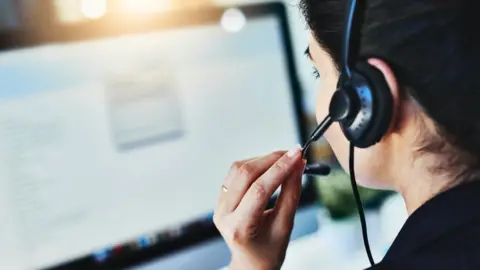 Getty Images A call centre worker