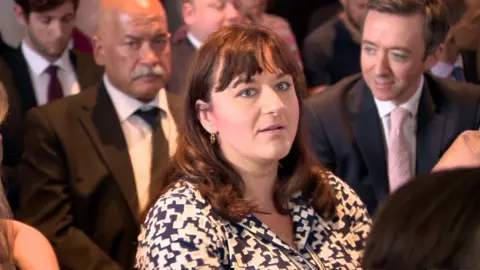 Labour MP Ruth Smeeth left the launch of the inquiry report after comments from a grassroots campaigner which she described as "anti-Semitic slurs"