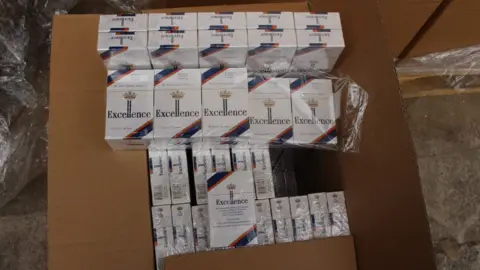 HM Revenue & Customs  They seized 1.6m branded cigarettes which they believe to be counterfeit goods