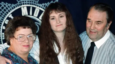 PA Media Stephanie Slater with parents at press conference