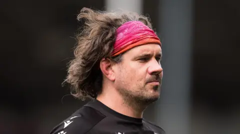 Dan Murphy looks on after the full-time whistle at Kingsholm