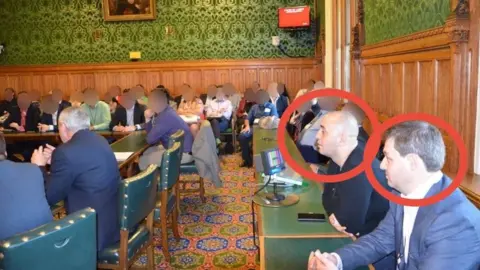 Orlin Roussev, front right, and Biser Dzhambazov, seated next to him, present in Committee Room 6 of the House of Commons