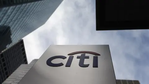 Mario Tama Citi logo