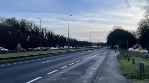 BBC/George Carden Traffic congestion on a major road.