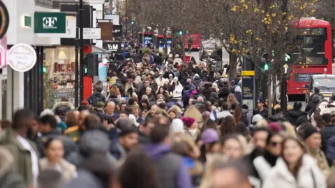 PA Media Shoppers on Oxford Street