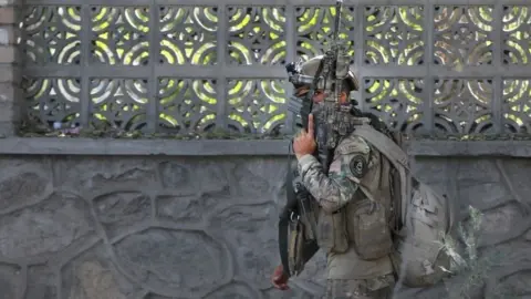 EPA Afghan security forces at the university