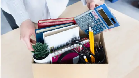Getty Images Packing up desk