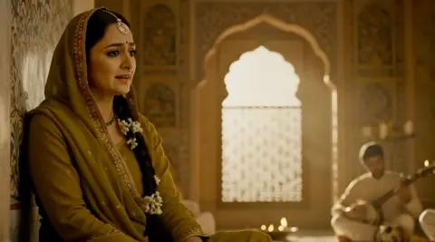 Intelliflicks Screenshot of the AI made movie showing a woman singing