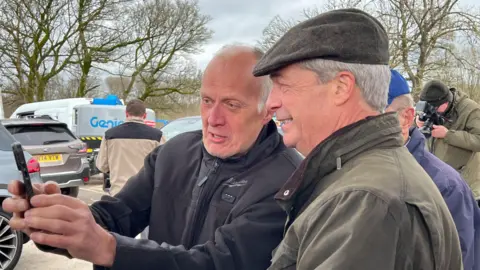 Two men taking a selfie 