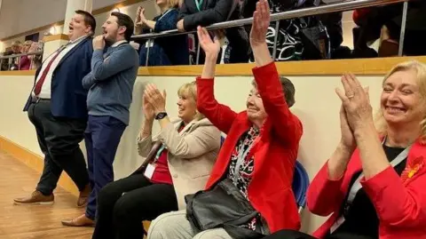 Cheering Labour supporters as the results are announced