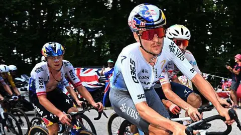 Tom Pidcock competes on stage 13 of the Tour de France