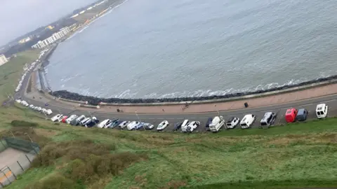 Keane Duncan Motorhomes parked up along Royal Albert Drive in Scarborough's North Bay