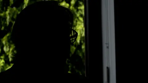 BBC A silhouetted photo of Tania