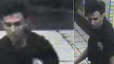 British Transport Police A blurred CCTV image of a young man in a London underground station. He has dark hair and is wearing a black polo shirt.