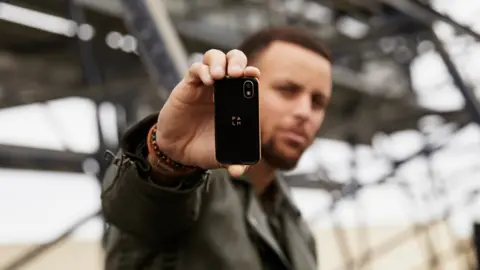 Palm Palm phone held by Stephen Curry